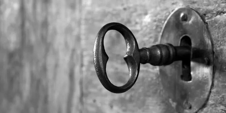old fashioned key in lock old fashioned key in lock